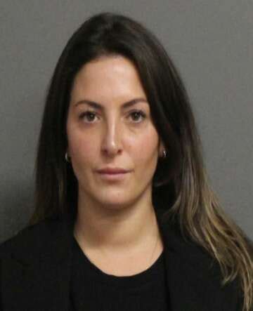 lunch lady arrested|Warrant: New Fairfield cafeteria aide sent student。